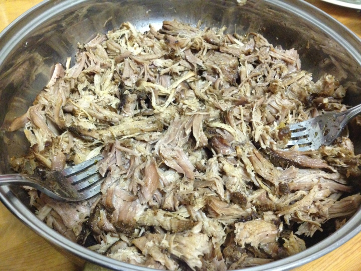 Pull all that pork apart. Using 2 forks. I also removed any fat that I saw - I prefer eating crispy fat or fat in liquid/saucey form.. :)